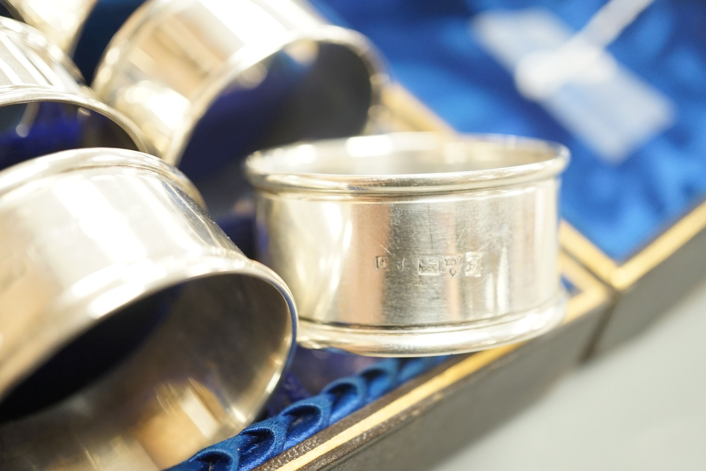 A cased matched set of six early 20th century plain silver napkin rings, by Charles Horner, Chester, various dates.